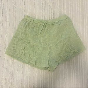 green flower shorts